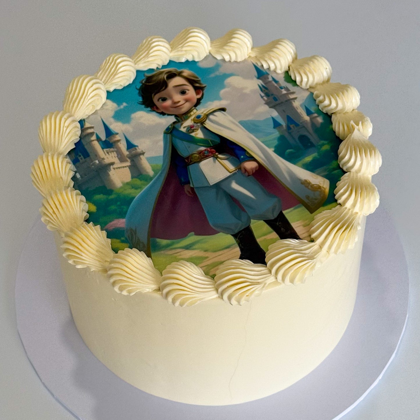Custom storybook prince edible cake topper with child's face illustration